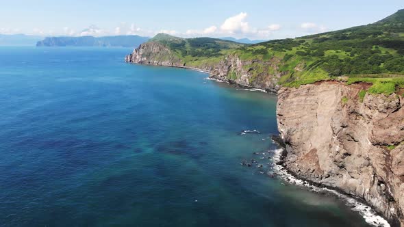 Stunning Aerial View Over the Rocky Ocean Coast alt
