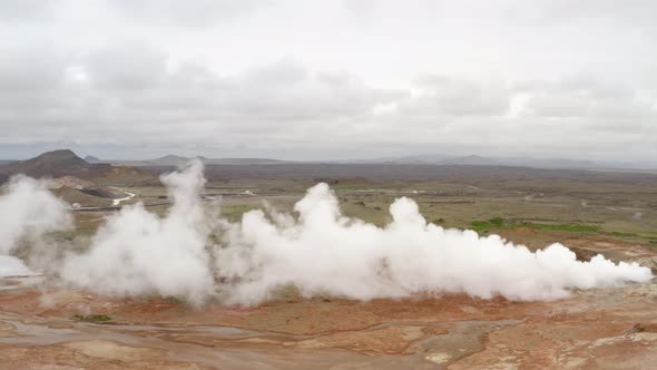 Steaming Mud Holes And Solfataras In The Geothermal Area In Iceland - aerial drone shot alt