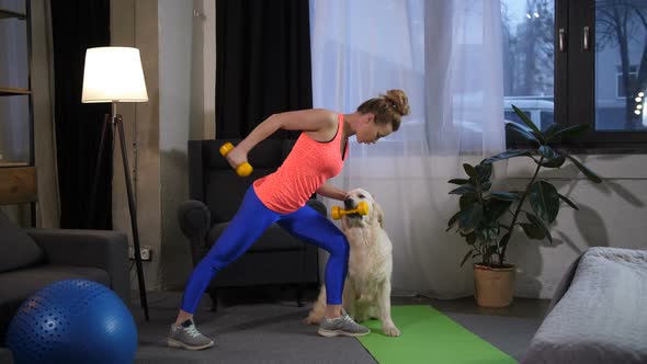 Sporty Fit Woman with Dog Assistant Training Arms alt