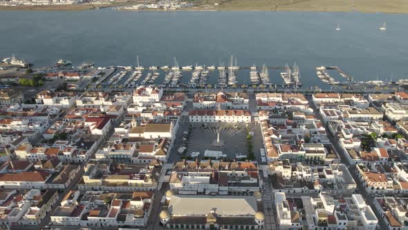 Vila Real de Santo Antonio cityscape with Praça Marquês de Pombal, main public square and marina wit alt
