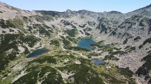 Aerial View of a Lake in the Pirin Mountains with Blue Clear Water alt