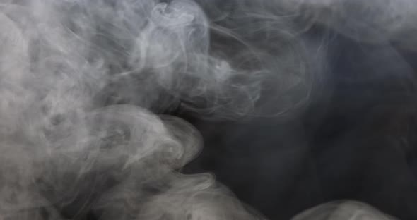 Smoke rising in swirling motion