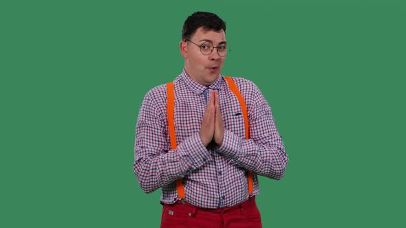 A Man with an Enthusiastic Surprised Expression on His Face Claps His Hands Applauds alt