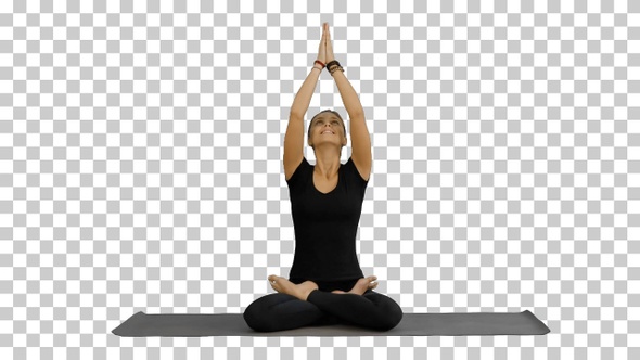 Young woman practicing yoga sitting in, Alpha Channel
