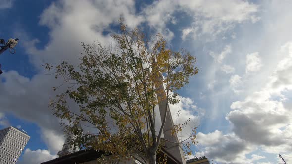 Bell tower of The Resurrection Cathedral, Tirana, Albania, against blue sunny sky alt