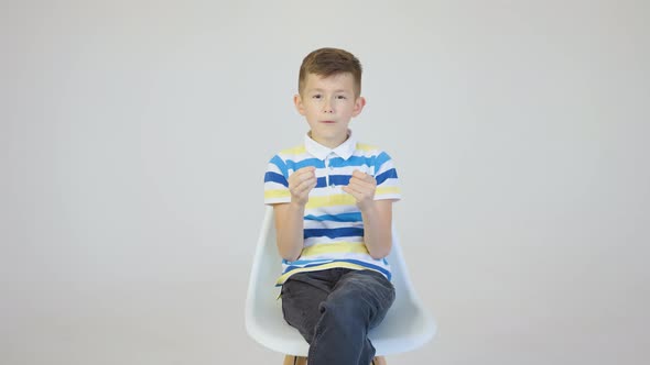 Child Boy Vlogger Kid Talking in Front of the Camera alt