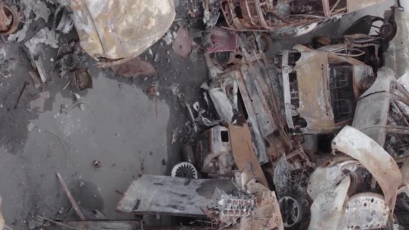 Vertical Video of a Dump of Destroyed Cars During the War in Ukraine alt