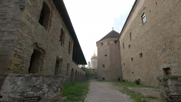 Stone walls inside Fagaras fortress alt