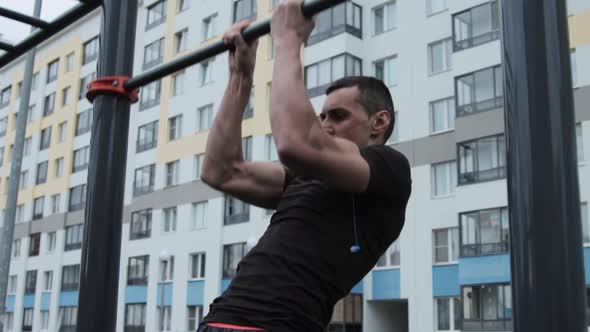 Man training outdoors on sports field