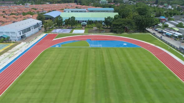 Aerial view new Stadium Top down from Drone view Green Football soccer field alt