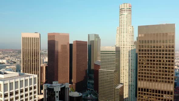 Cinematic urban aerial time lapse of downtown Los Angeles skyline. alt
