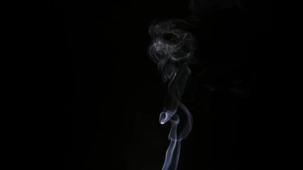 smoke rising by dispersing, steam, fog, smoke rising in the black background