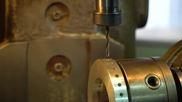 Closeup of a Working Drill on a Lathe alt