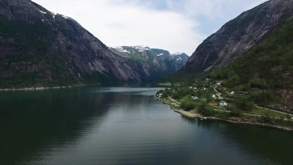 Scenic flight above Hardanger fjord in Norway, aerial footage.