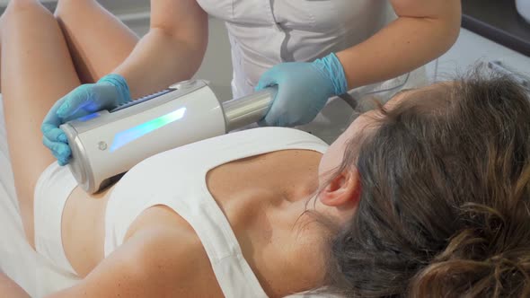 Woman Getting Endospheres Therapy Massage on Her Stomach