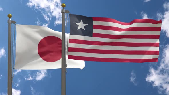 Japan Flag Vs Liberia Flag On Flagpole alt