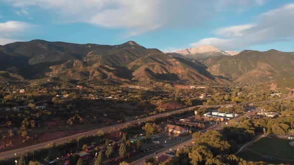 High altitude aerial view of the mountains and city suburbs of Colorado Springs, Colorado, USA.  Sno alt
