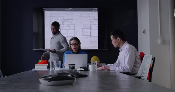 Business professionals working in a modern office alt