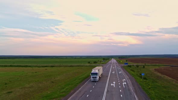Aerial View of a Truck on the Highway alt
