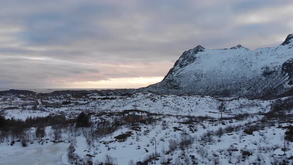 Frozen landcape, with mountains covered with snow - Lofoten islands - Norway