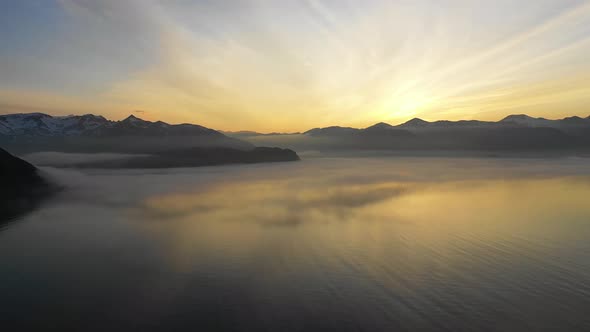 Aerial view of Dutch Harbour at sunset, Unalaska, Alaska, United States. alt