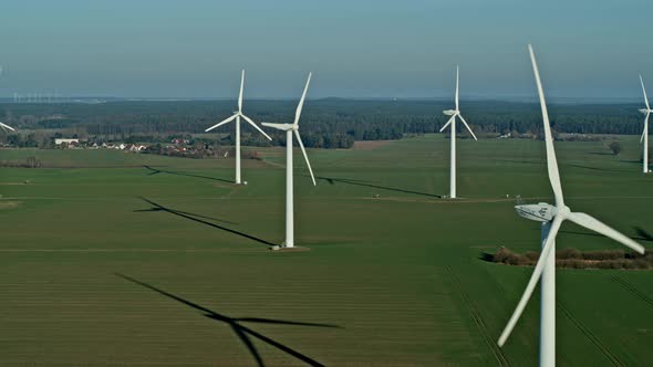 Aerial View Over the Farm Landscape and Wind Turbines