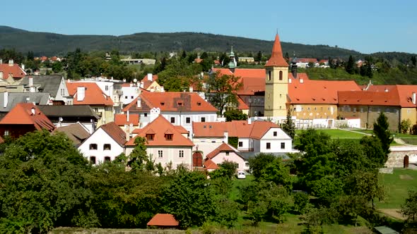 View of Historical Buildings Surrounded By Trees and Plants in the City alt