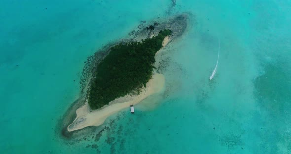 Drone Top Shot Beautiful Lonely Island in the Turquoise Water Boat Goes Near