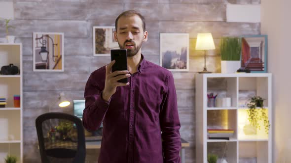 Man Leaving the House Gives a Voice Command and the Lights Are Turning OFF alt