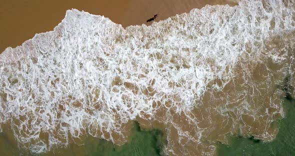 Tropical Landscape of Sand Beach and Sea Waves Rolling in