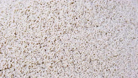 Secondary granule made of polypropylene, White Plastic pellets crumbles alt