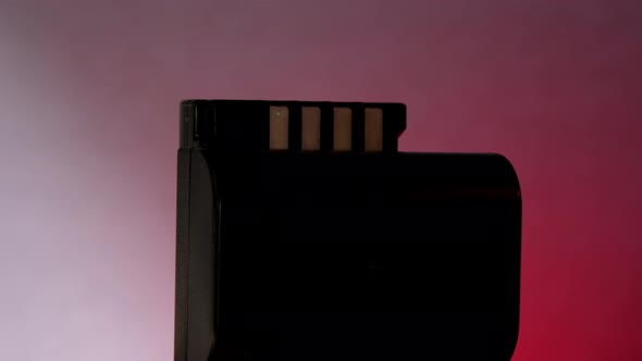 Telephone Cell Battery Rotates on Back Flashing Background alt