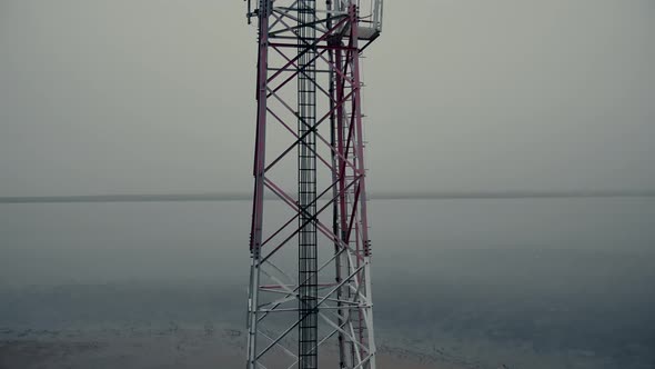 Motion Up Along Contemporary Cell Tower on Coastal Area