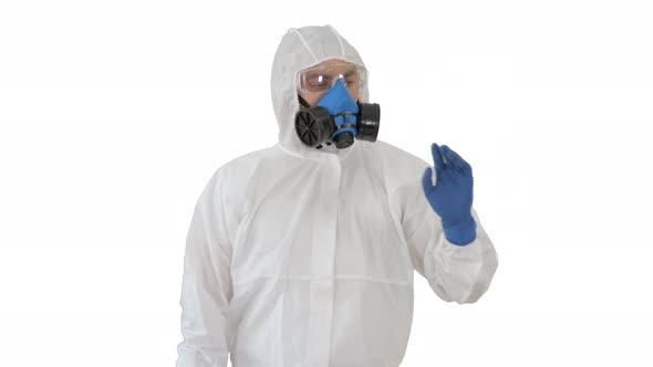 Medical Doctor in Hazamat Clothes Pointing on Imaginary Screen on White Background alt