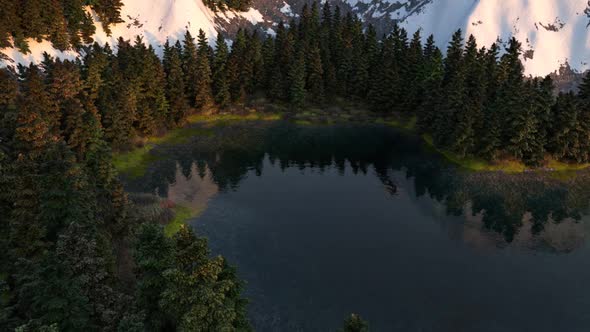 A Small Lake Surrounded By Woods 02