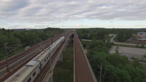 Drone Shot Flying up Between Railway Bridges