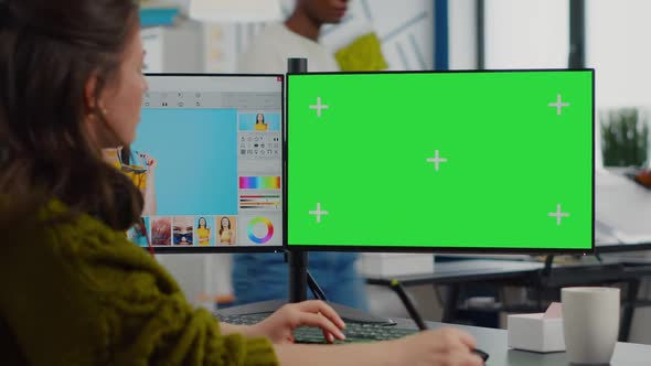 Creative Retoucher Editing Photos Using Chroma Key Display alt