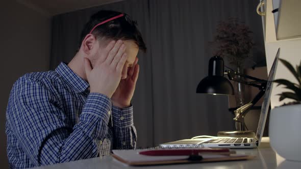 Man rubbing tired eyes. Problem with glasses, eyesight or vision. Distance work alt