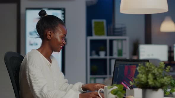 Black Freelancer Game Developer Typing on Keyboard Developing Videogame alt