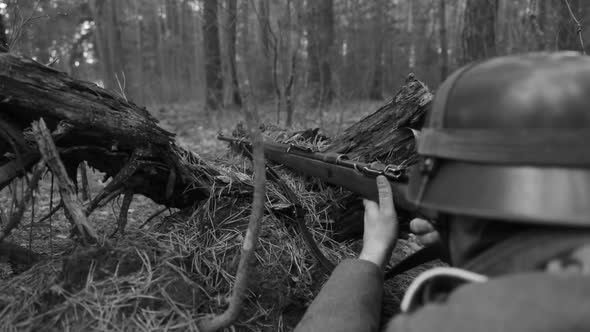World War II German Wehrmacht Infantry Soldier Aiming Shooting And Reload Rifle in Spring Autumn alt
