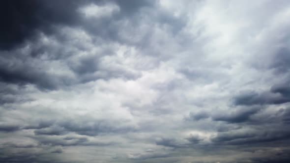 Emergence of New Clouds in the Overcast Sky Foreshadowing a Storm alt