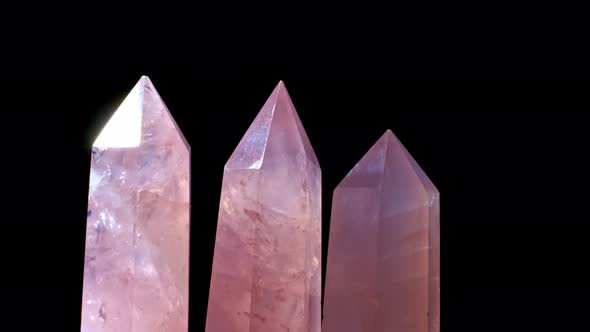 Pinck Quartz and Crystal on Rotates on a Black Background alt