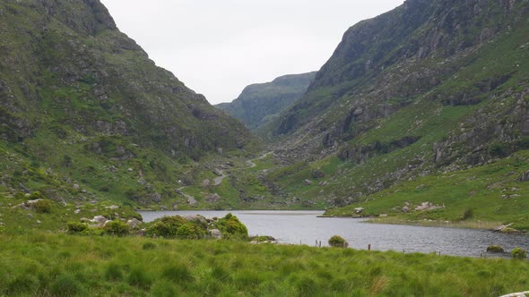 Black Lake At The Head Of The Gap Of Dunloe In County Kerry, Ireland. wide shot alt