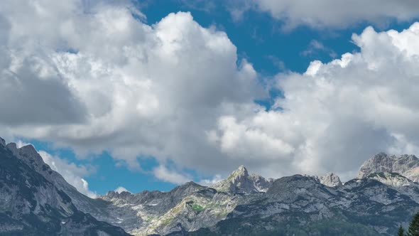 Timelapse Landscape of High Mountains in the Clouds in China alt