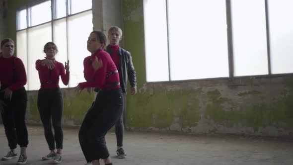 Dance Ensemble Showing Modern Performance for Shooting a Video or Rehearsing Making a Dance Battle alt