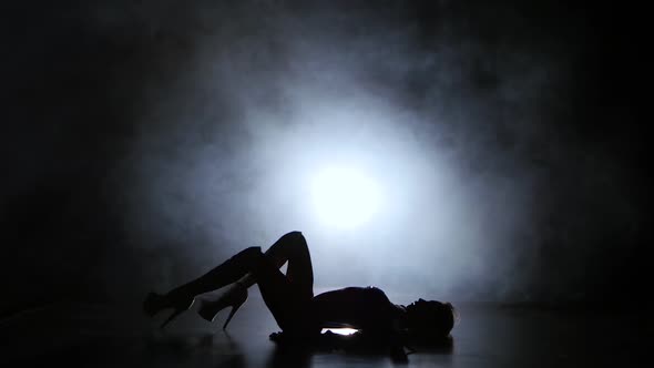 Sexy Nightclub Dancer Girl in Lingerie Dances Lying on Floor alt