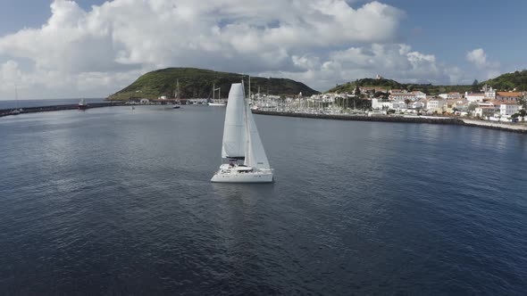 Aerial View of Sailboat in a regatta off the coast of Matriz, Azores, Portugal. alt