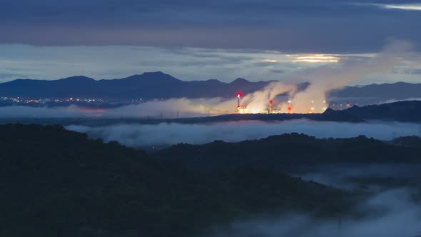 Twilight time with fog and background Mae moh coal power plant.