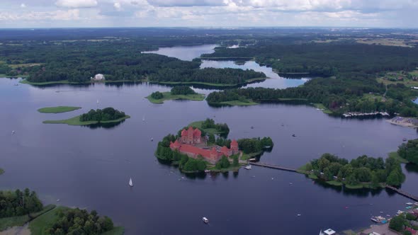 smooth aerial footage of the ancient Trakai castle on the island alt