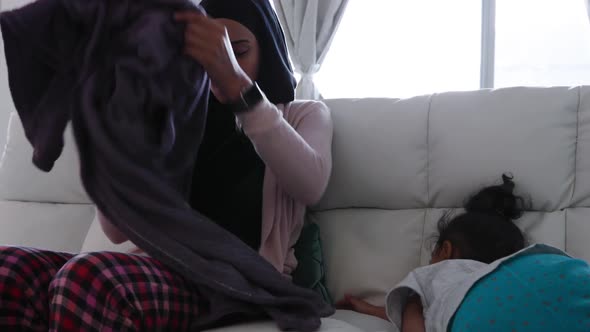 Mother and daughter at home alt